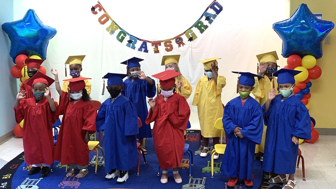 Students in graduation gowns. 2